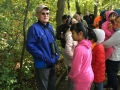Neil Gore conducts a birding tour of Hall’s Pond
