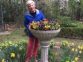 Marie Claire Kamin, just after she finished planing the urn with spring flowers.