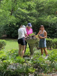 Janet Wynn with volunteers at the
Spring Community Day.